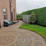 Circular pavement surrounded by grass