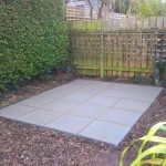 square pavement surrounded by stones